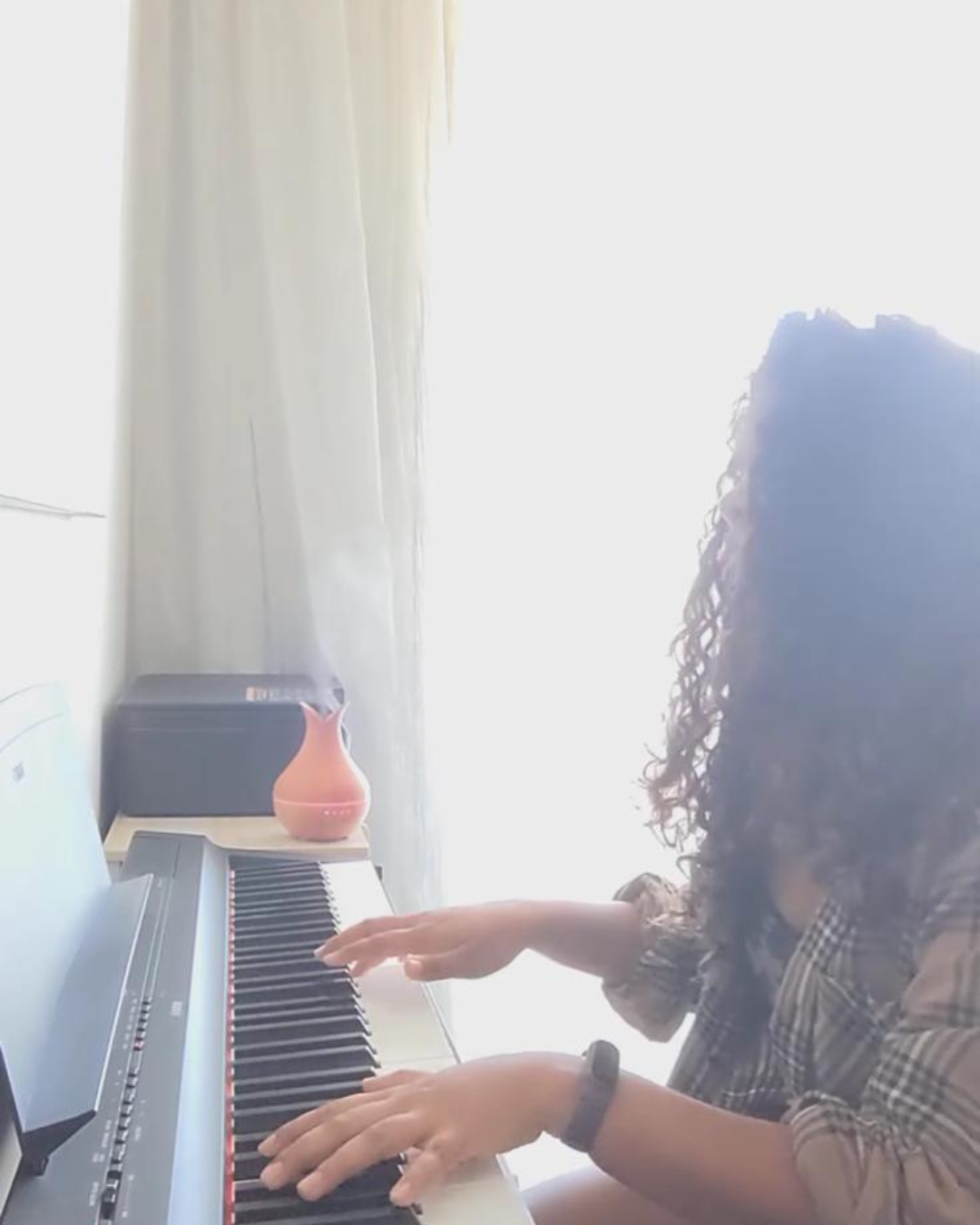 Jana playing piano